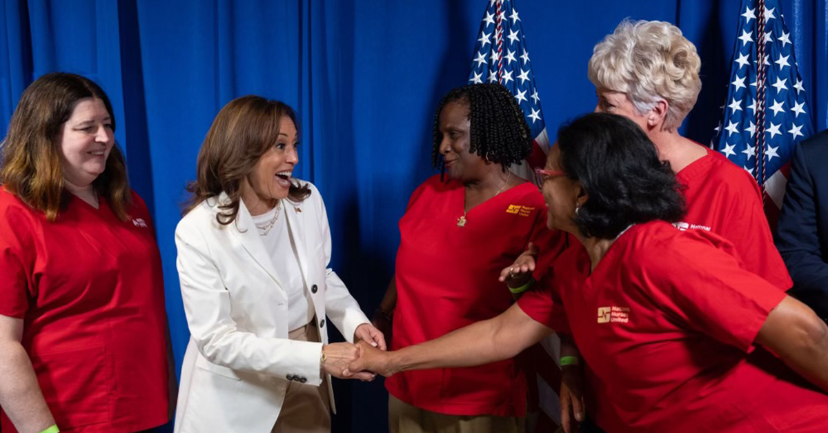 Four members of NNU leadership smiling and shaking hands with Kamala Harris