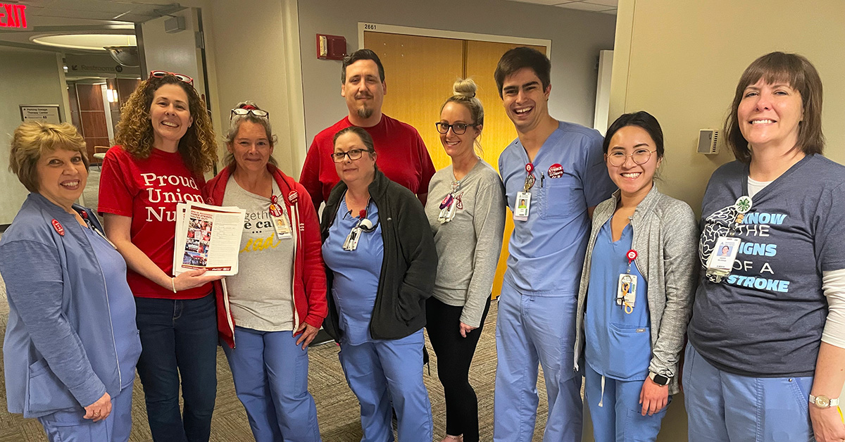 Group of nurses inside hospital smiling