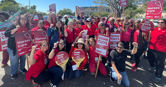 Alameda Hospital nurses picket to protest elimination of surgical services.