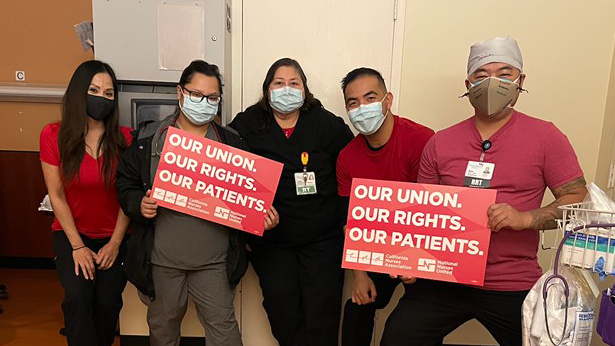 Kindred San Gabriel nurses and health care workers hold signs "Our Union, Our Rights, Our Patients"