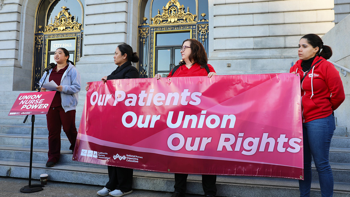 Nurses holding banner "Our Patients, Our Union, Our Rights"