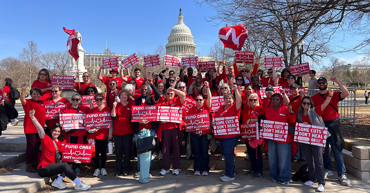 Large group of nurses outside Capitol building in Washington, D.C., holding signs "Fun Care, Not Billionaires" and "Some Cuts Don't Heal"