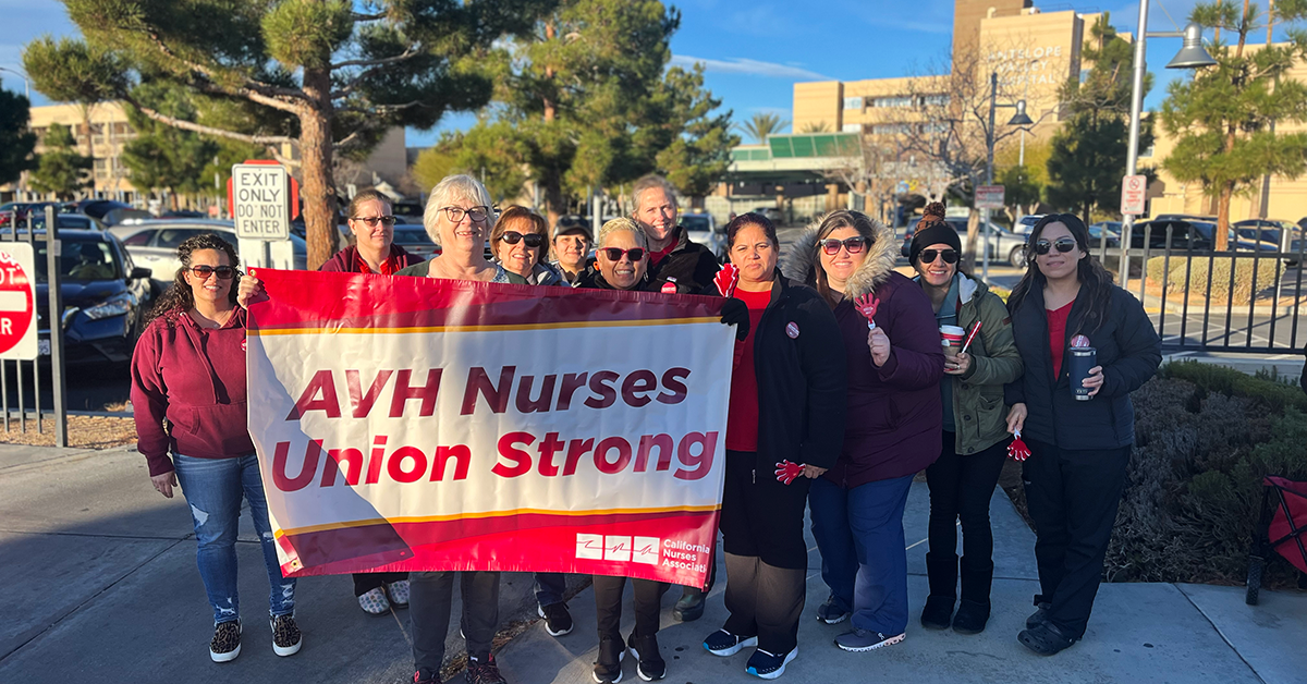 Antelope Valley nurses holding banner "AVH Nurses Union Strong"