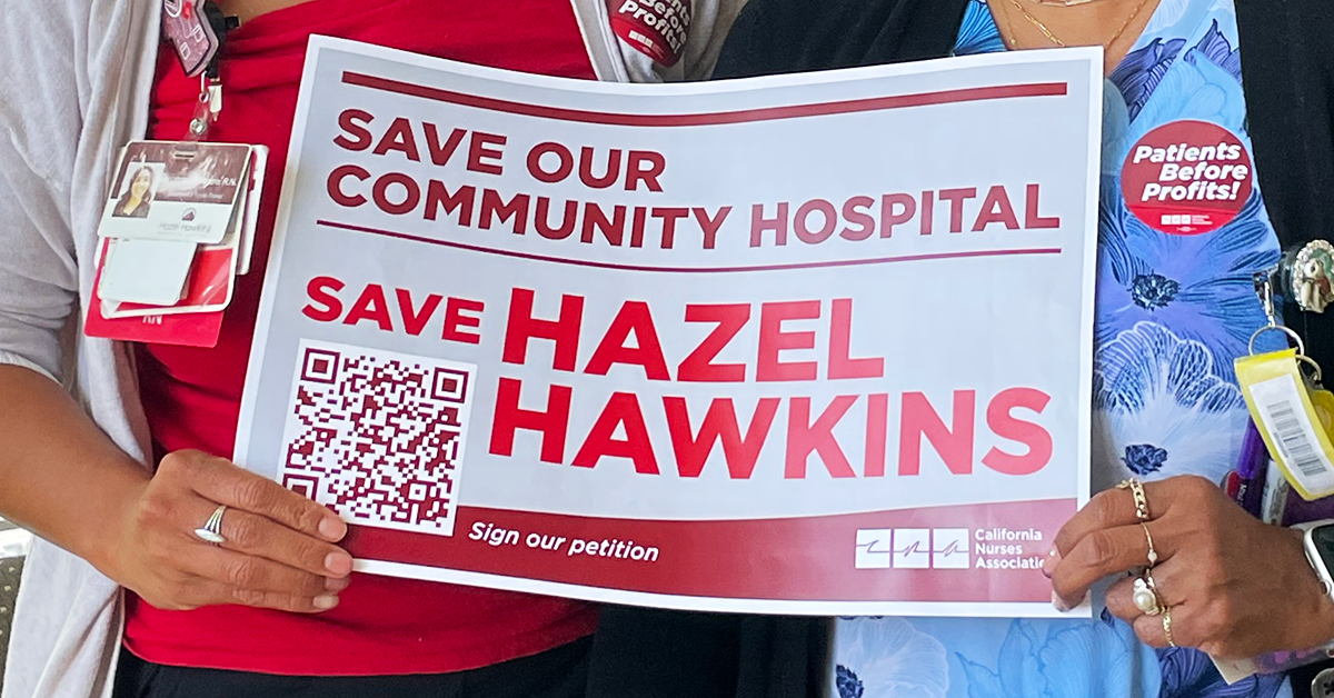 RNs holding sign "Save our community hospital. Save Hazel Hawkins."