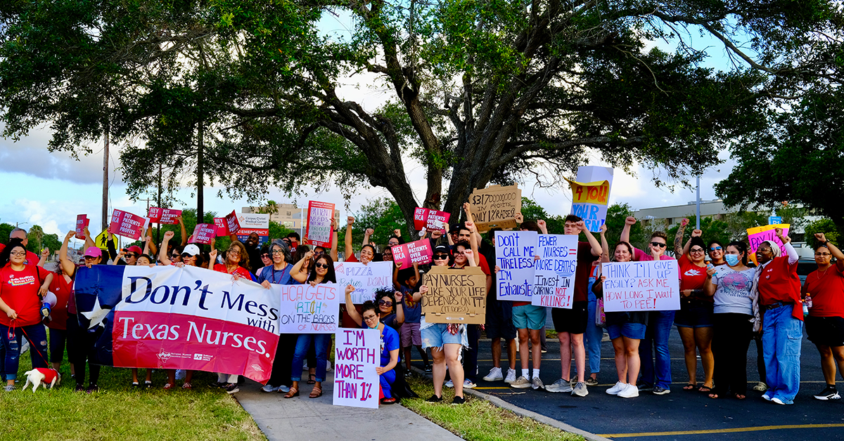 Lots of nurses holding signs, including a big banner "Don't mess with Texas nurses"