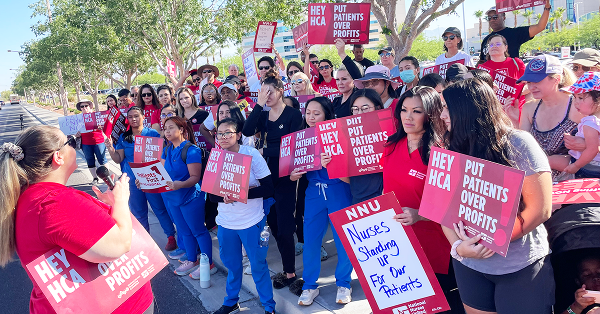 MountainView nurses holding signs like "Save Lives: Safe Staffing Now", "Hey HCA put patients over profits"