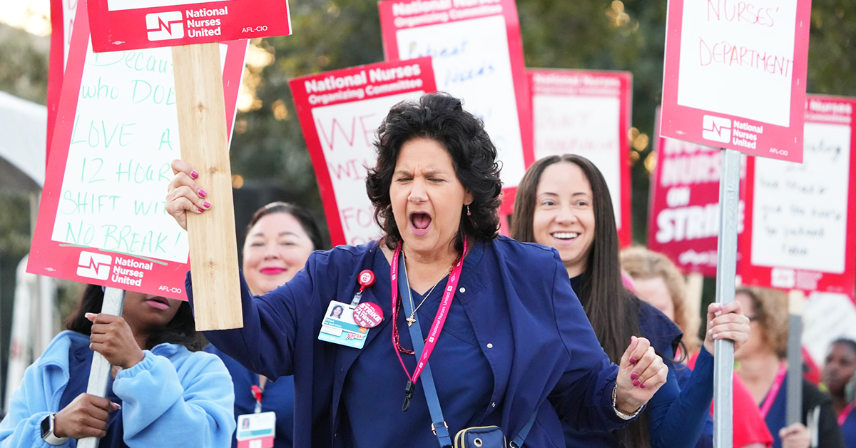 Nurses marching with signs