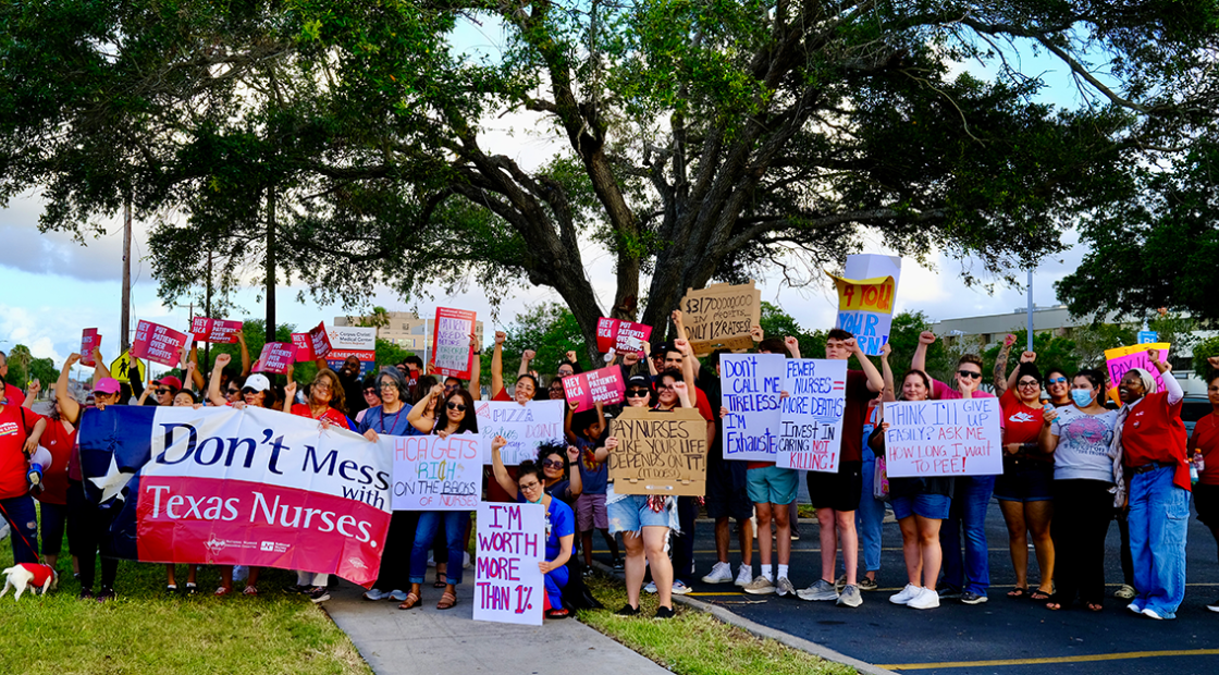 Lots of nurses holding signs, including a big banner "Don't mess with Texas nurses"