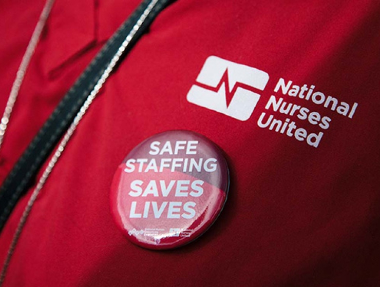 Nurse button "Safe Staffing Saves Lives"