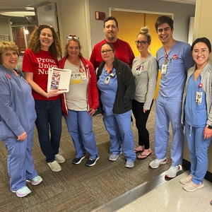 Group of nurses inside hospital smiling