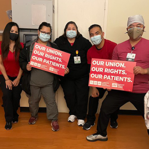 Kindred San Gabriel nurses and health care workers hold signs "Our Union, Our Rights, Our Patients"