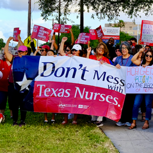 Lots of nurses holding signs, including a big banner "Don't mess with Texas nurses"