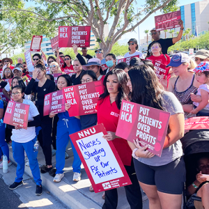 MountainView nurses holding signs like "Save Lives: Safe Staffing Now", "Hey HCA put patients over profits"