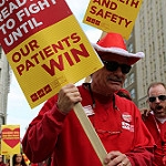 Sign "...fight until our patients win"