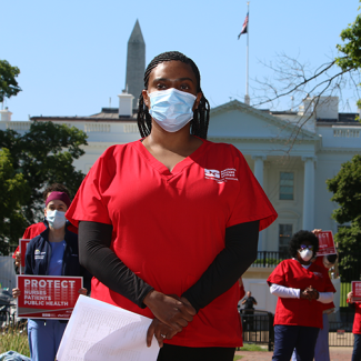 Nurse in front of whitehouse