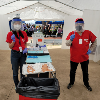 Nurses preparing to administer vaccines