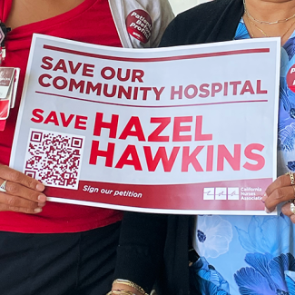RNs holding sign "Save our community hospital. Save Hazel Hawkins."
