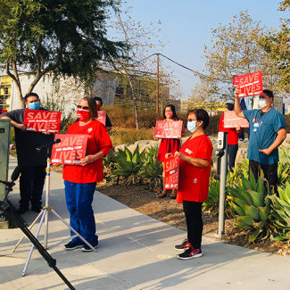 RNs and Caregivers from Palomar Health holding a press conference 